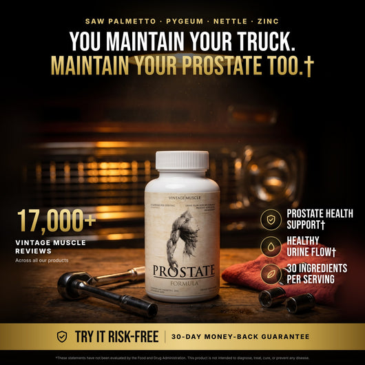 Vintage Muscle Prostate Formula bottle on a garage workbench. You maintain your truck. Maintain your prostate too. 30-day money-back guarantee.